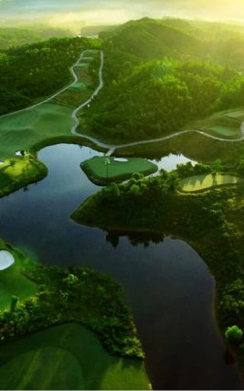 Aerial view of Ba Na Hills Golf Course with water hazards and hills