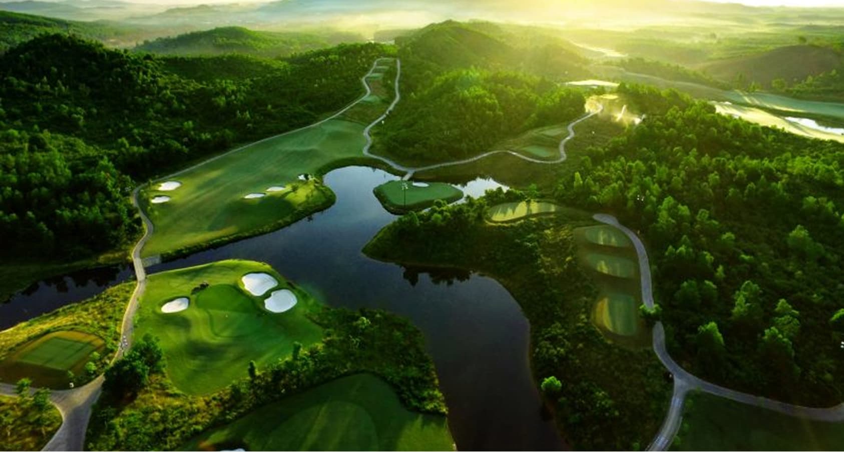 Aerial view of Ba Na Hills Golf Course with water hazards and hills