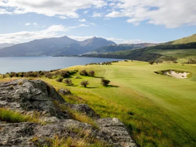 Scenic Jack's Point Golf Course overlooking lake and mountains in New Zealand