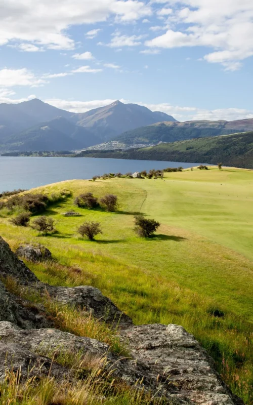 Scenic Jack's Point Golf Course overlooking lake and mountains in New Zealand