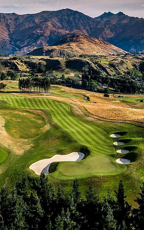 Aerial view of scenic Millbrook Golf Club, Coronet Course with mountain backdrop