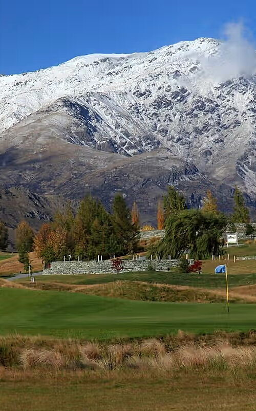 Millbrook Golf Club, Remarkables Course with snow-capped mountains in New Zealand