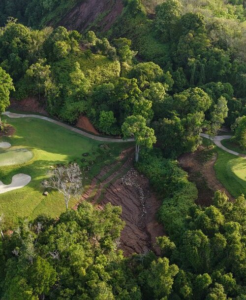 Aerial view of Red Mountain Golf Club with sand bunkers. Play Red Mountain Golf Club with Golfing Getaways